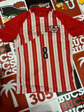 Red and white jersey #8