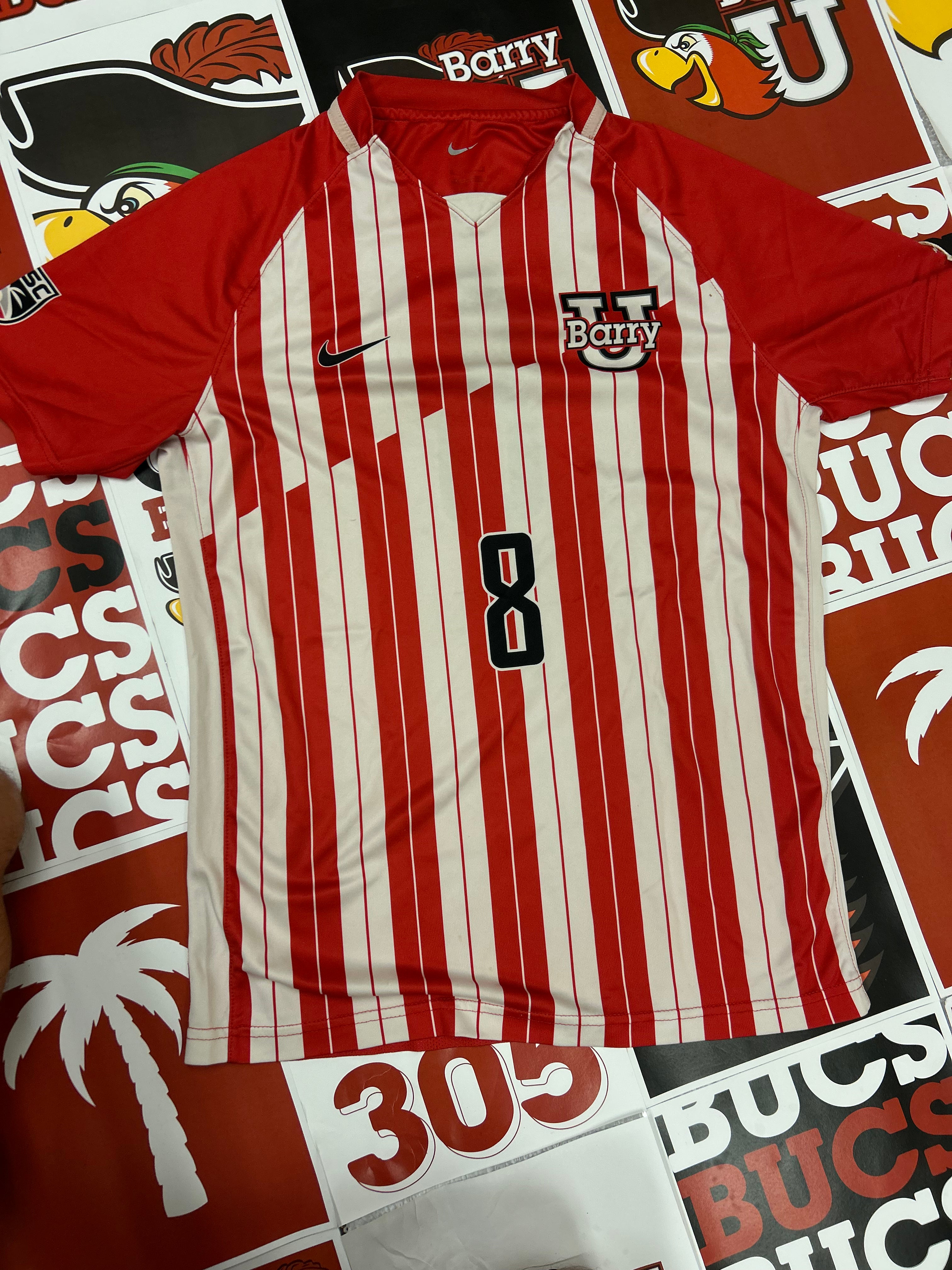 Red and white jersey #8