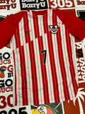Red and white jersey #7