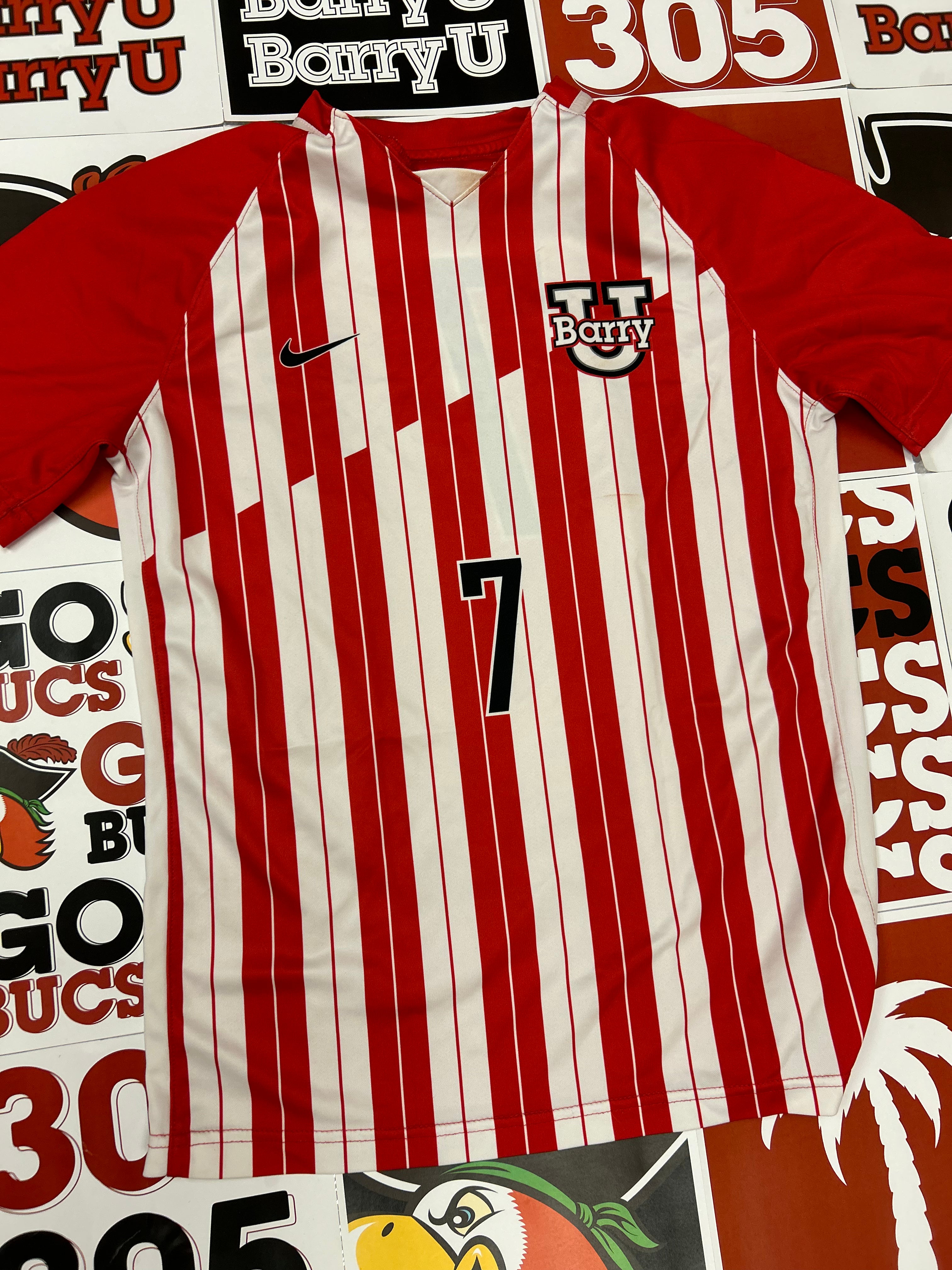 Red and white jersey #7
