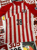 Red and white jersey #38