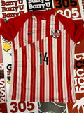 Red and white jersey #14