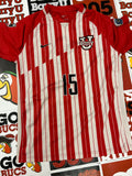 Red and white jersey #15