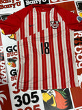 Red and white jersey #18