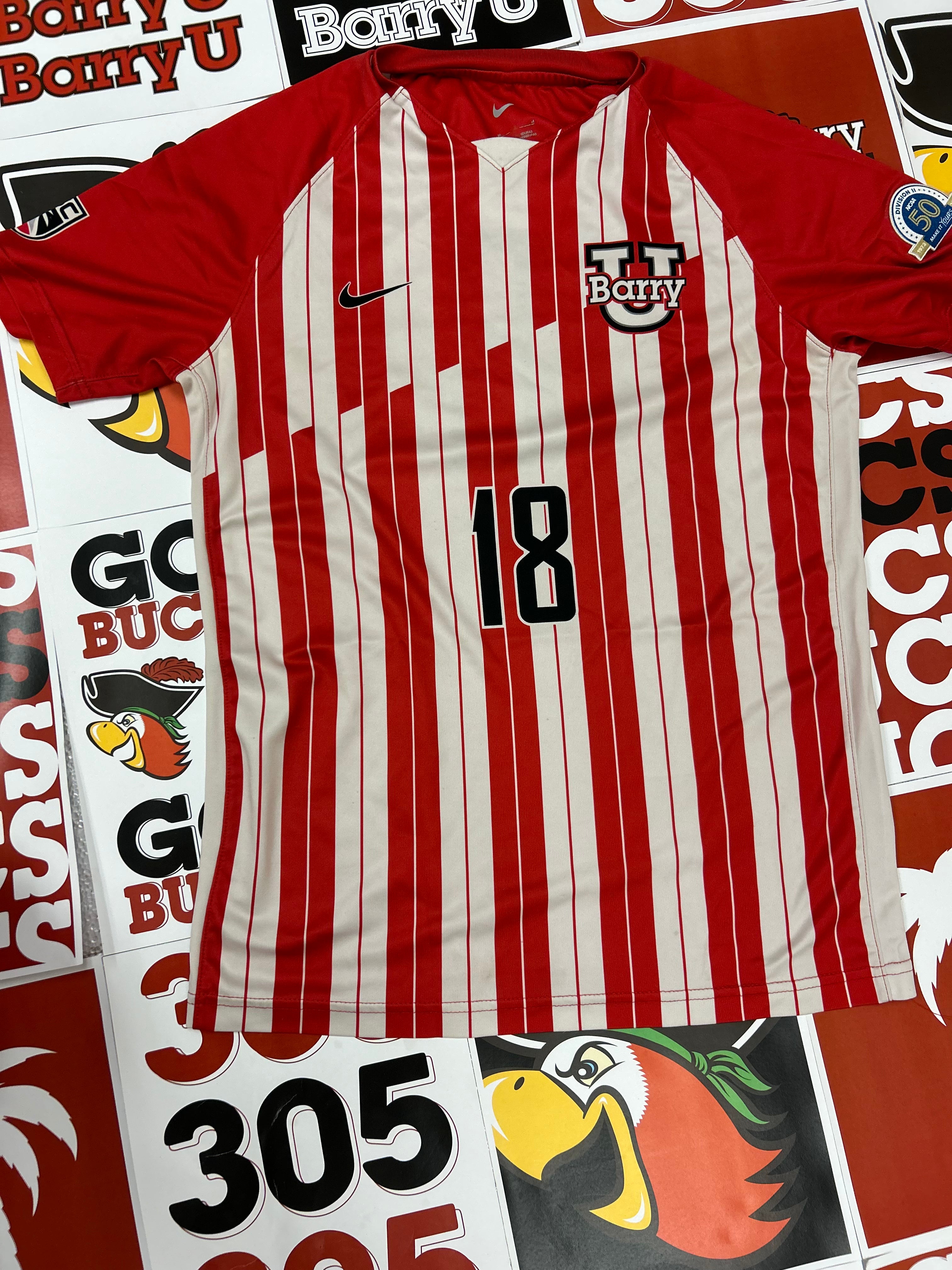 Red and white jersey #18