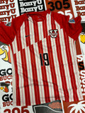 Red and white jersey #19