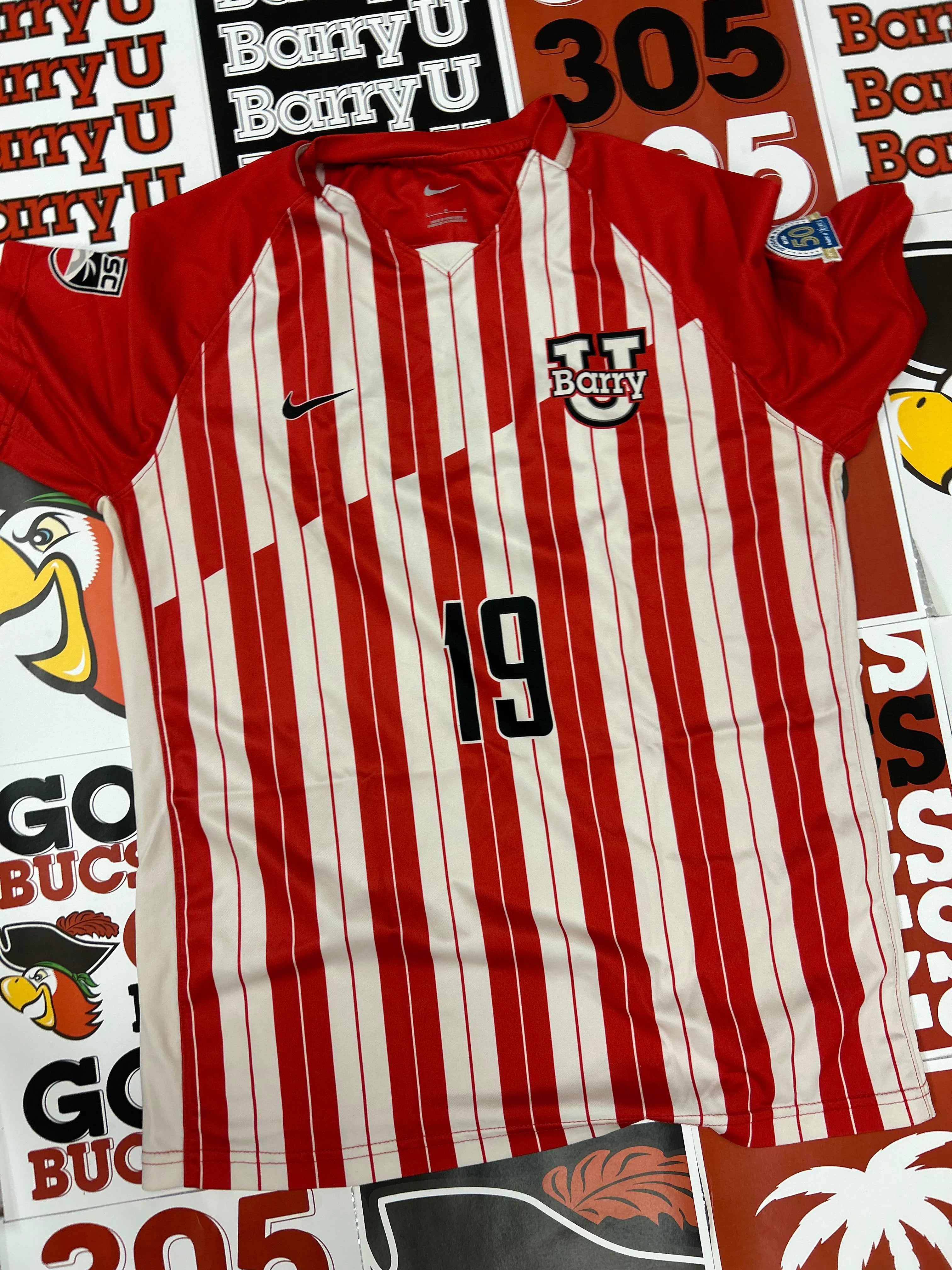 Red and white jersey #19