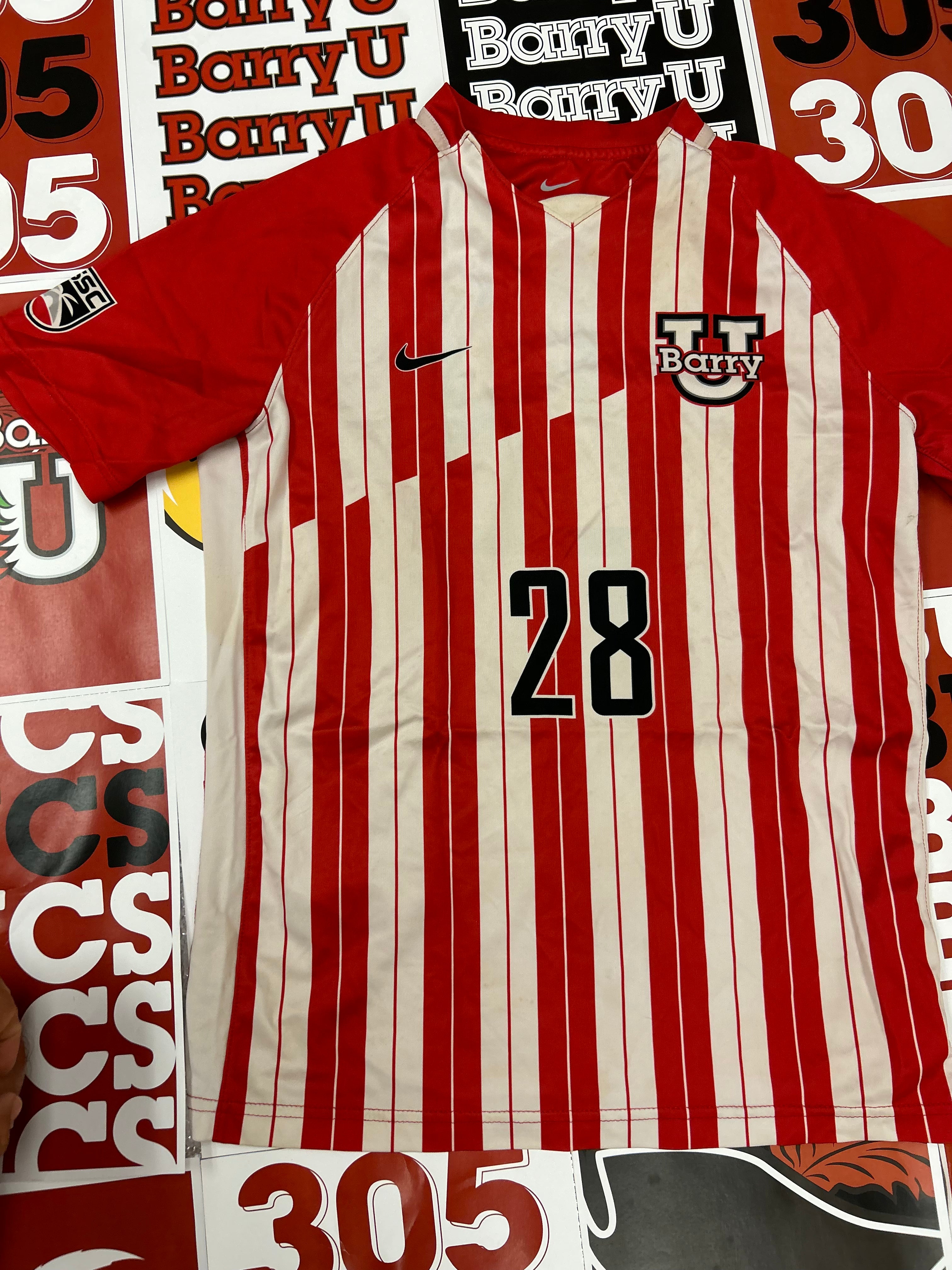 Red and white jersey #28