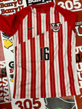 Red and white jersey #16