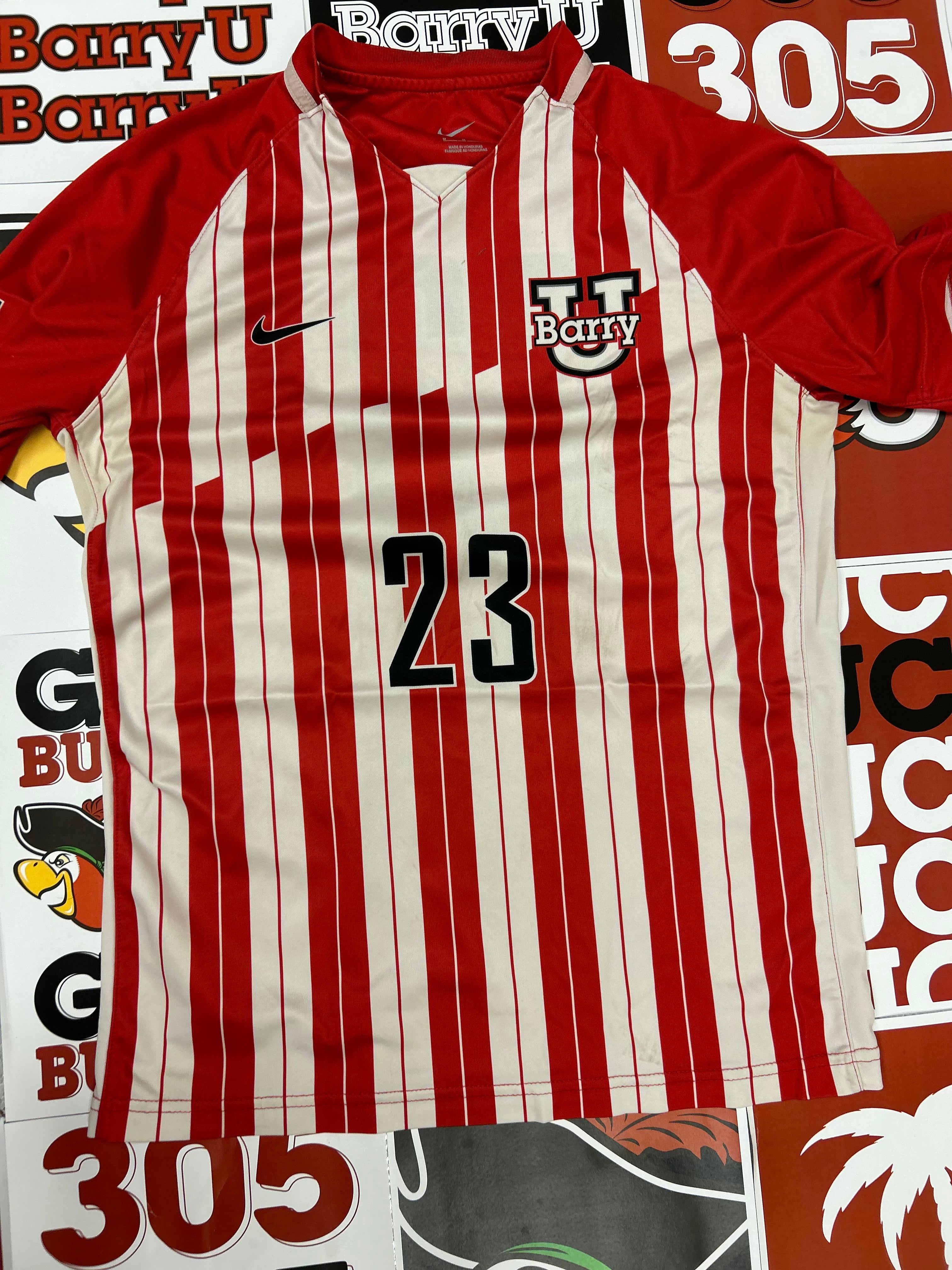 Red and white jersey #23