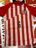 Red and white jersey #6