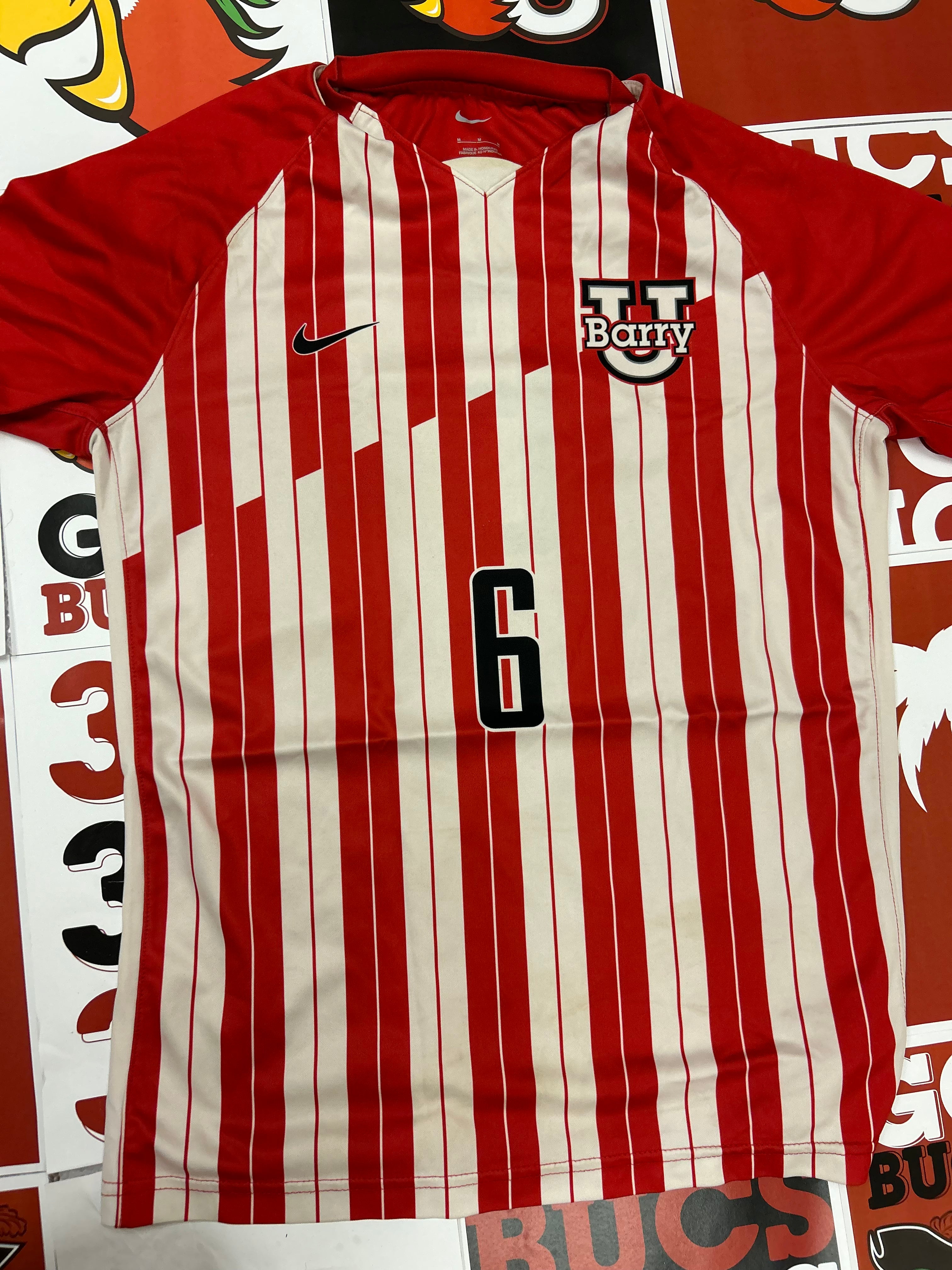 Red and white jersey #6